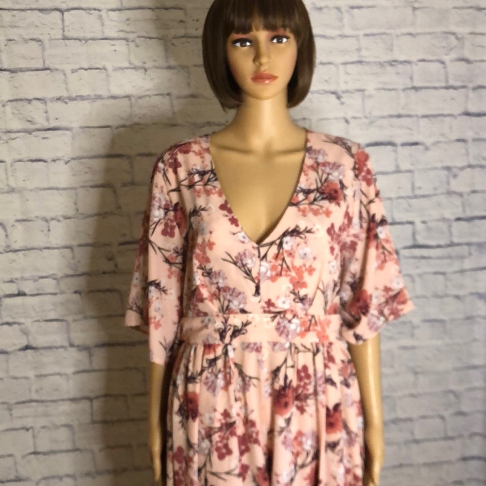 Beautiful peach floral maxi romper.